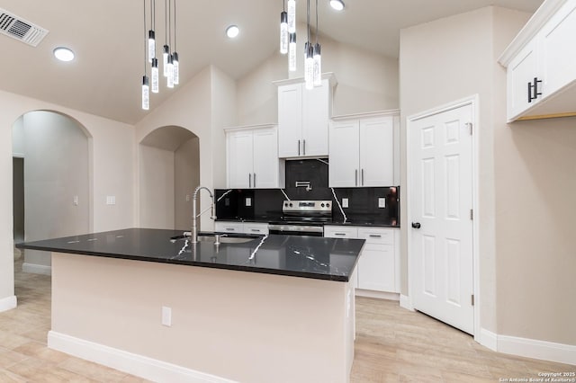 kitchen with stainless steel electric range, hanging light fixtures, a center island with sink, and white cabinets