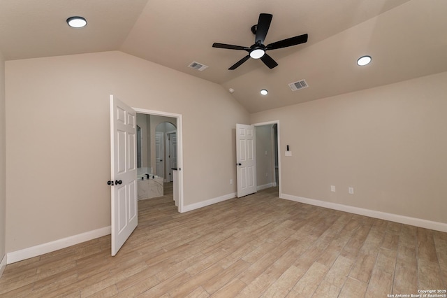 unfurnished bedroom featuring lofted ceiling, light hardwood / wood-style flooring, and ceiling fan