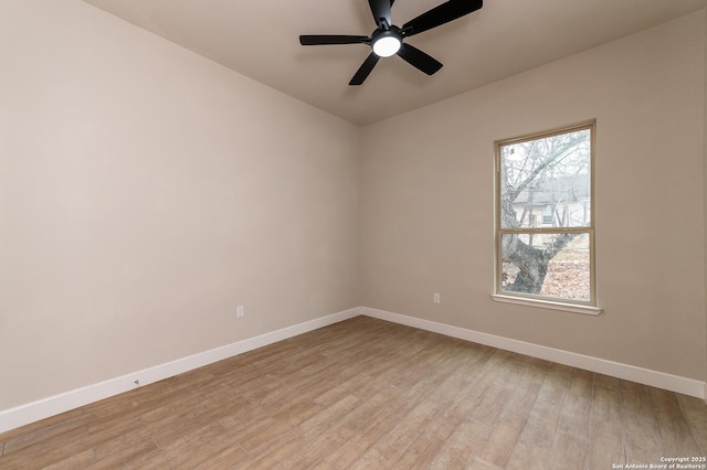 spare room with ceiling fan and light hardwood / wood-style floors