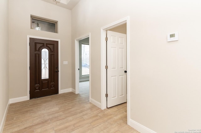 entryway with light hardwood / wood-style flooring