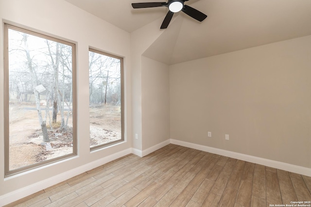 empty room with light hardwood / wood-style flooring and ceiling fan