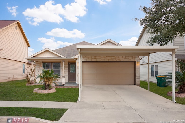 view of front of property featuring a garage and a front lawn