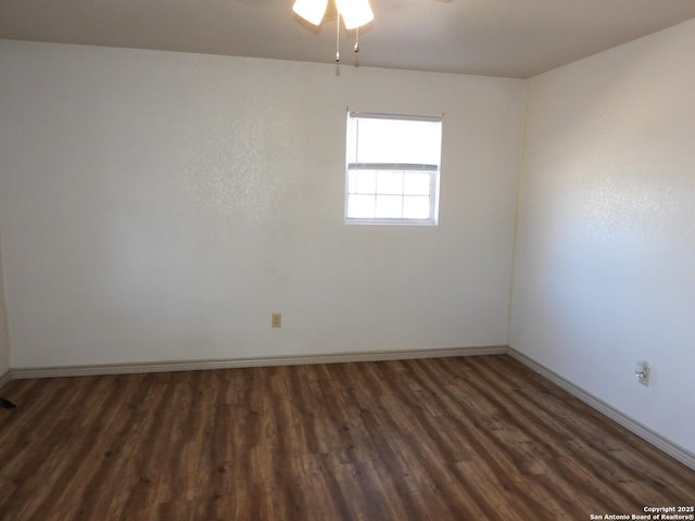 empty room featuring dark hardwood / wood-style floors