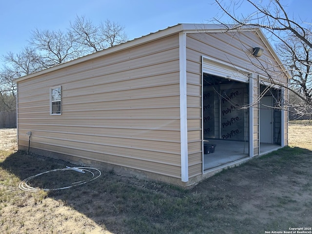 view of outbuilding with a garage