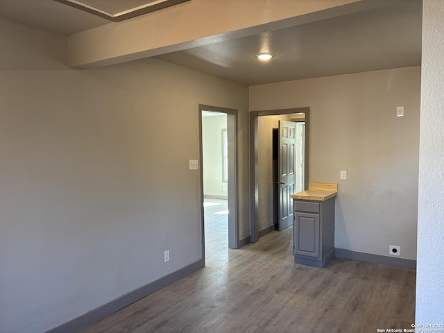 empty room featuring hardwood / wood-style floors