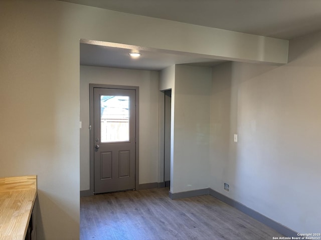 foyer entrance featuring light wood-type flooring