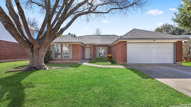 single story home featuring a garage and a front yard