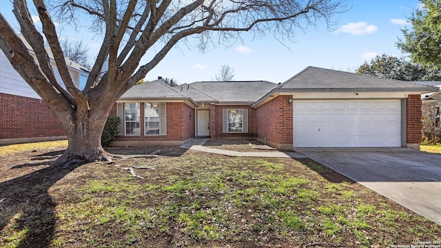 ranch-style house featuring a garage