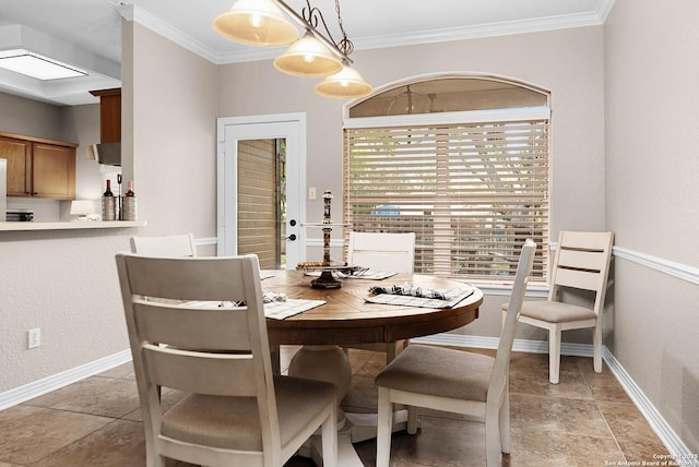 dining room featuring ornamental molding