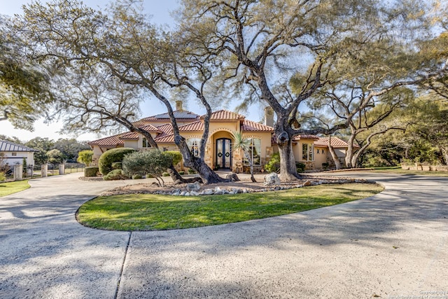 view of mediterranean / spanish house