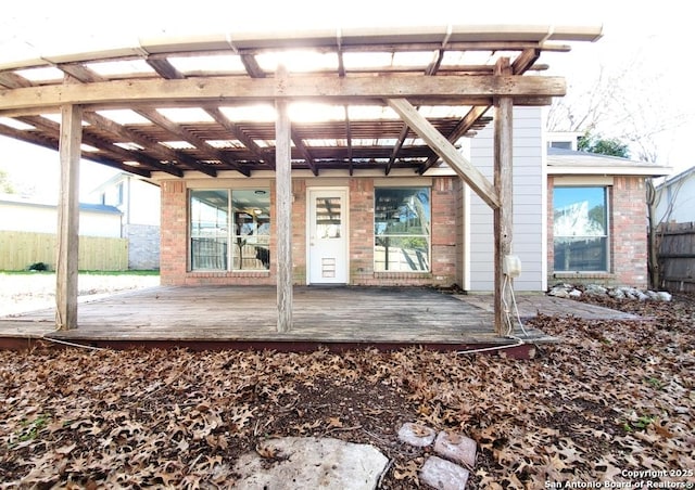 view of patio / terrace with a deck and a pergola