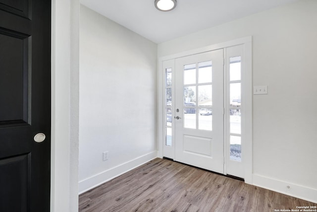 entrance foyer featuring light wood-type flooring