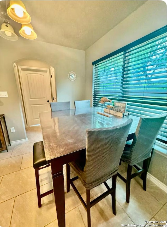 view of tiled dining space