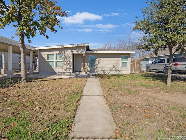 view of front of property with a front lawn