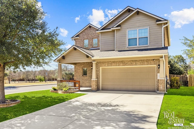 craftsman-style home with a garage, a front lawn, and covered porch