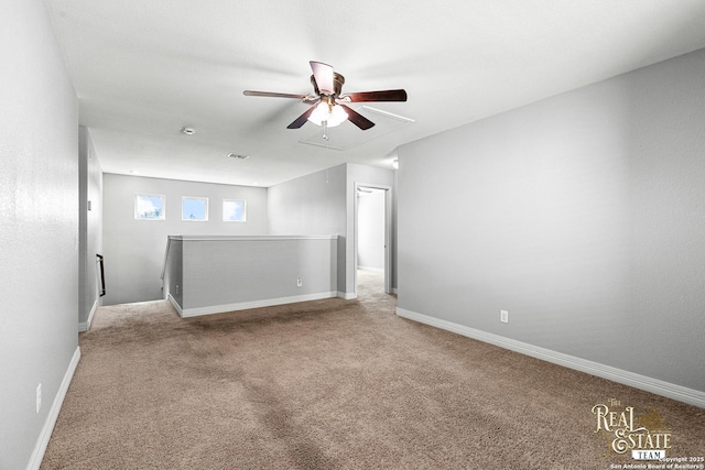 unfurnished room featuring carpet