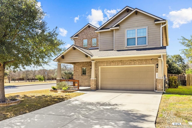 craftsman-style home featuring a garage and covered porch