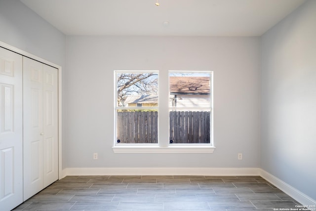 unfurnished bedroom featuring a closet