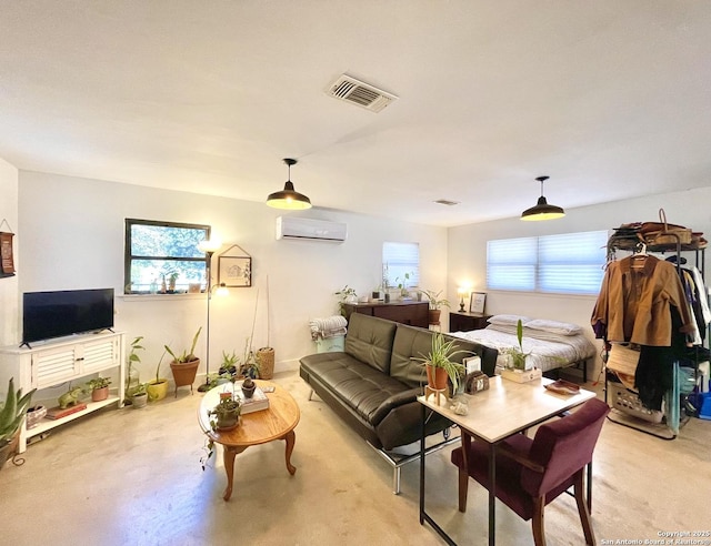 living room with a wall unit AC