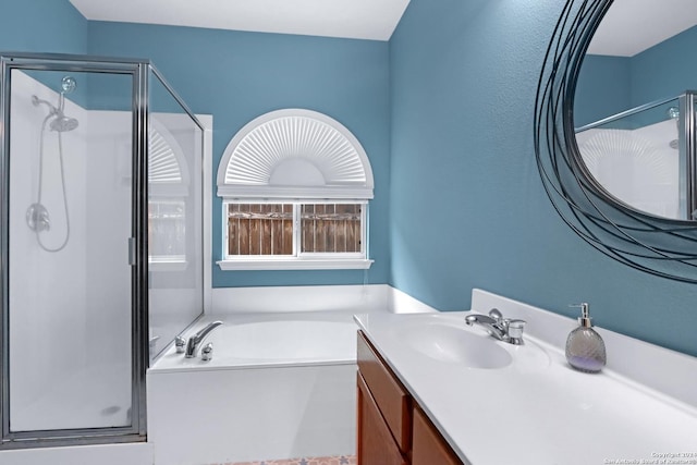 bathroom with vanity and plus walk in shower