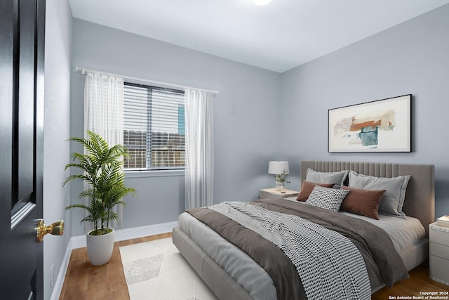 bedroom featuring light wood-type flooring