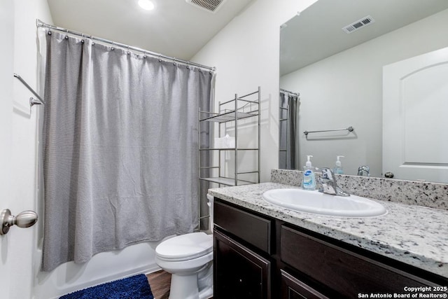 full bathroom featuring toilet, vanity, shower / bathtub combination with curtain, and hardwood / wood-style flooring