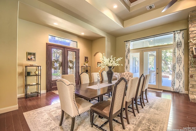 dining room featuring dark hardwood / wood-style floors and french doors