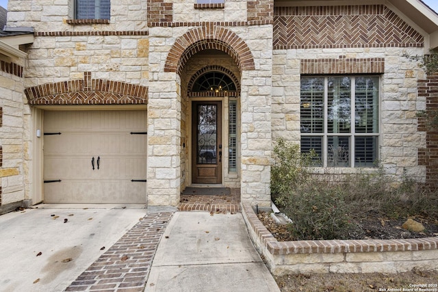 entrance to property featuring a garage