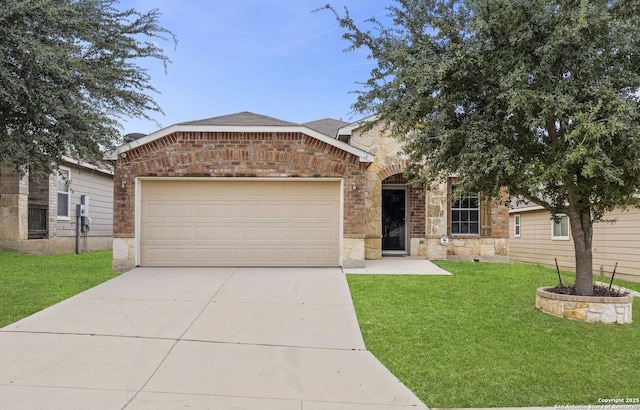 view of front facade with a garage and a front yard