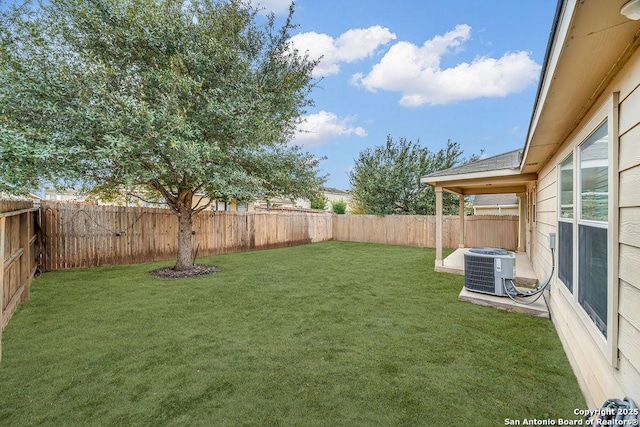 view of yard featuring central AC unit