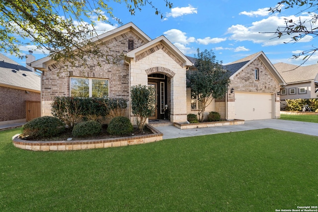 view of front of home with a garage and a front yard