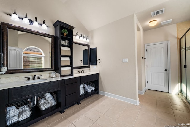 bathroom with lofted ceiling, an enclosed shower, tile patterned flooring, and vanity