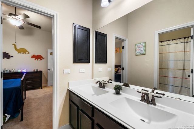 bathroom featuring vanity and ceiling fan