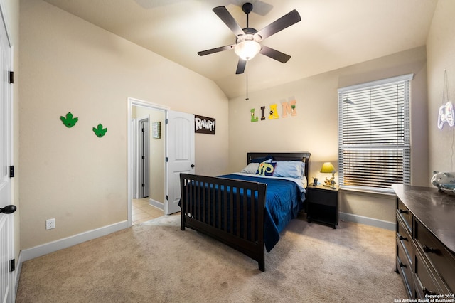 bedroom with lofted ceiling, light colored carpet, and ceiling fan