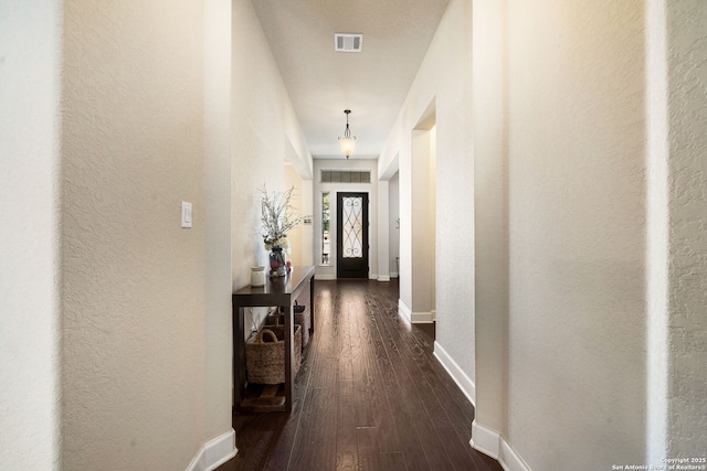 hall featuring dark hardwood / wood-style flooring