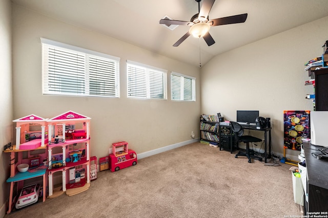 office with ceiling fan, lofted ceiling, and light carpet