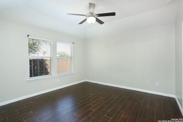 unfurnished room featuring ceiling fan, baseboards, and wood finished floors