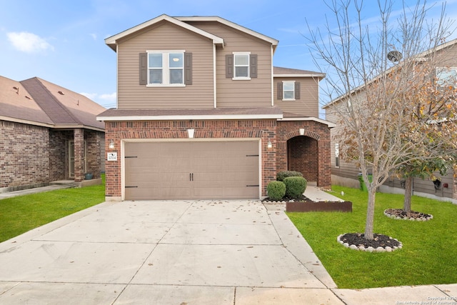 view of property with a garage and a front lawn