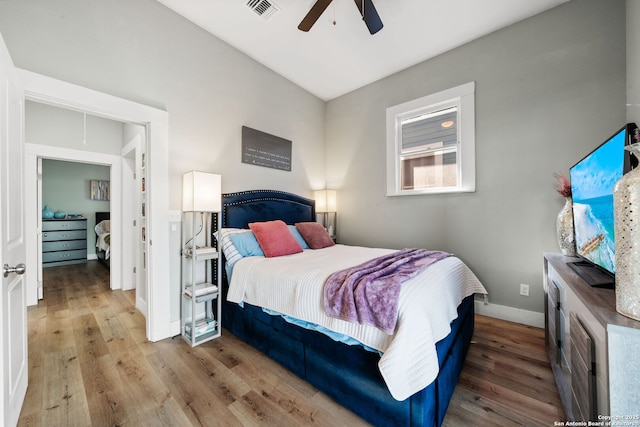 bedroom featuring hardwood / wood-style flooring and ceiling fan