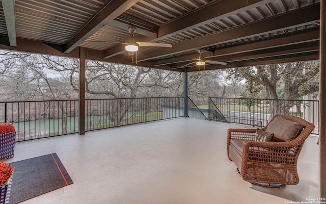 view of patio featuring ceiling fan