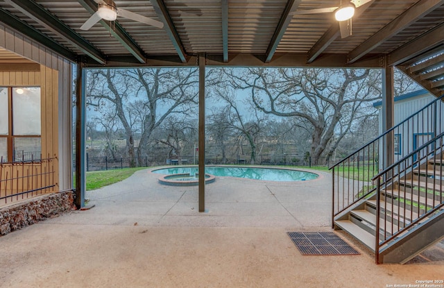 view of swimming pool with an in ground hot tub and a patio