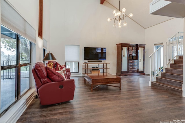 living room with beamed ceiling, dark hardwood / wood-style floors, and high vaulted ceiling