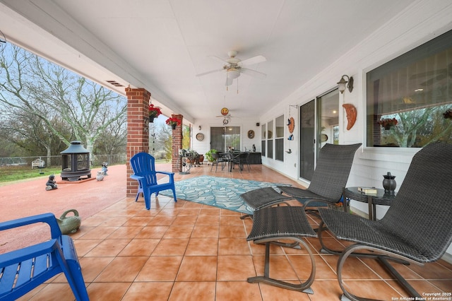 view of patio / terrace featuring ceiling fan