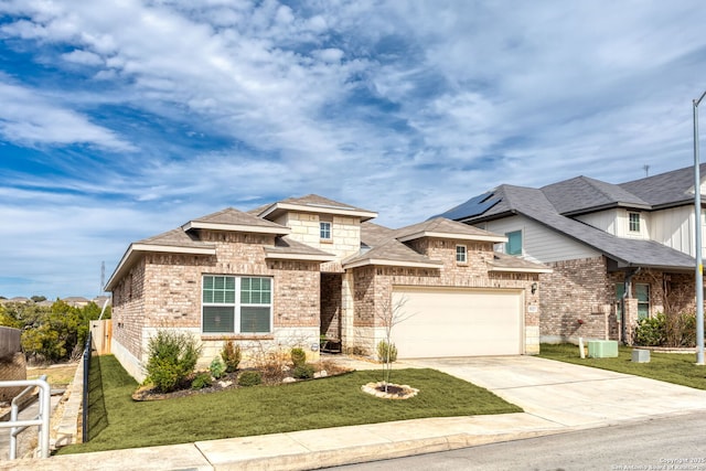 view of front of house featuring central AC, a garage, and a front lawn