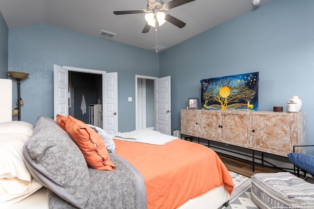 bedroom with ceiling fan and hardwood / wood-style floors