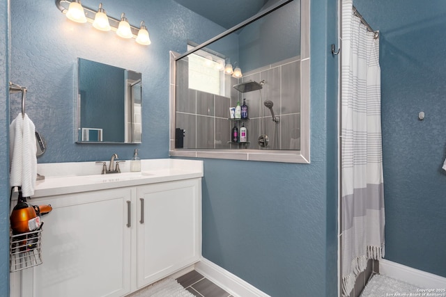 bathroom with vanity and a shower with shower curtain