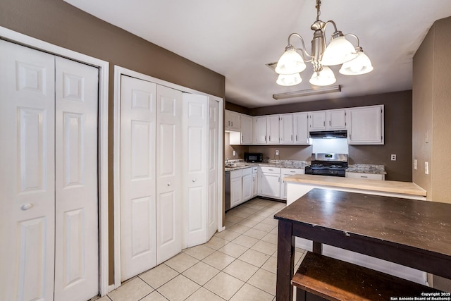 kitchen with decorative light fixtures, a chandelier, light tile patterned floors, stainless steel appliances, and white cabinets