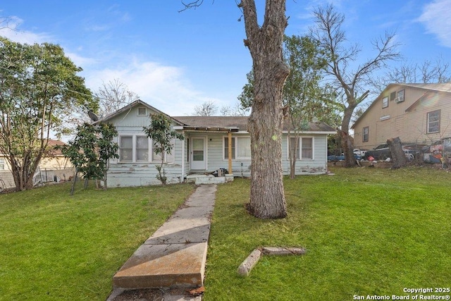 view of front of home with a front yard