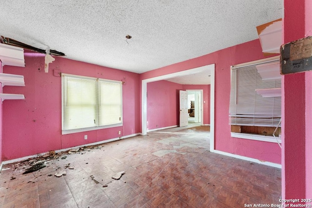 interior space featuring a textured ceiling