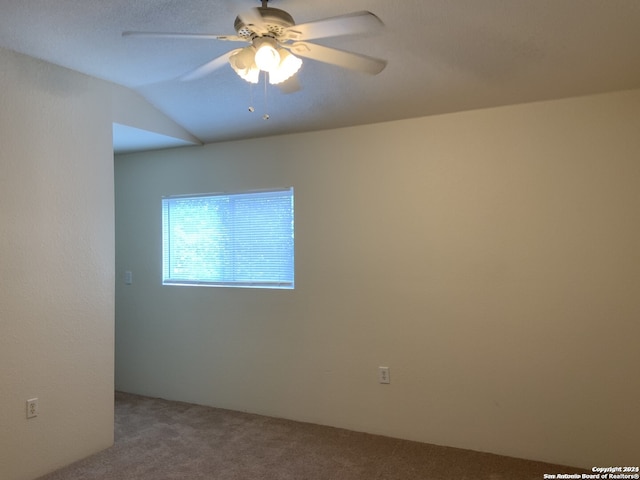 empty room featuring carpet and ceiling fan